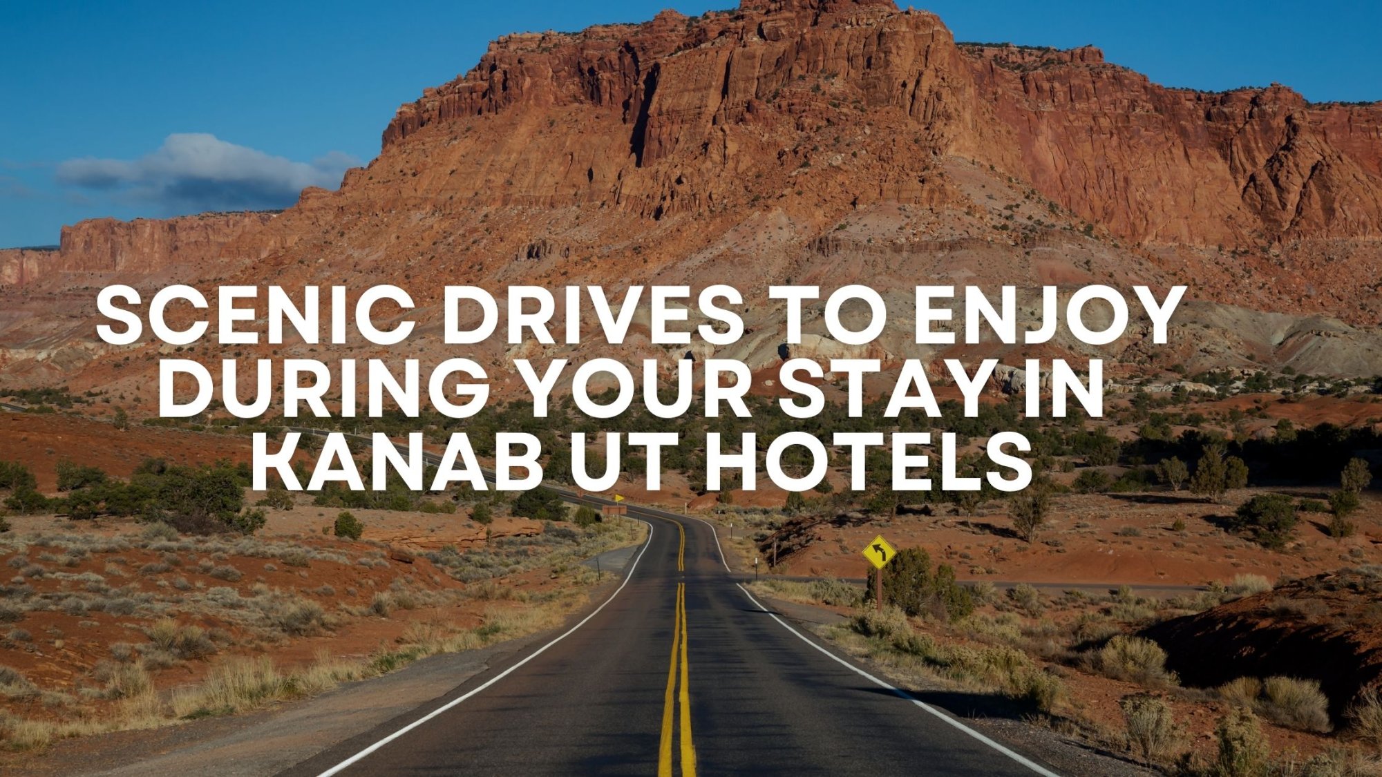 A paved road leads toward red rock cliffs under a blue sky, with text overlay: “Scenic drives to enjoy during your stay in Kanab UT hotels.”.
